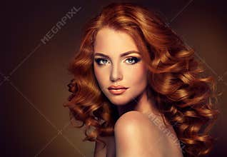 Girl model with long curly red hair.