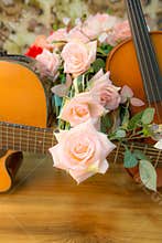 Violin,guitar, and rose