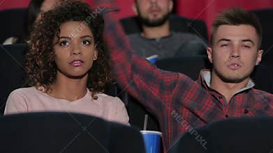 Young couple at the cinema