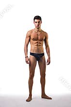 Handsome, fit young man in underwear isolated on