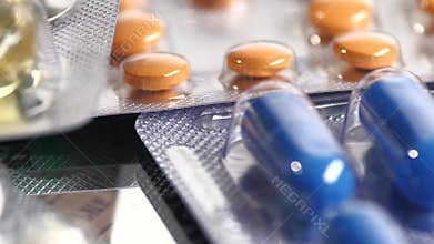 Colorful contraceptive pills, rotation, reflection
