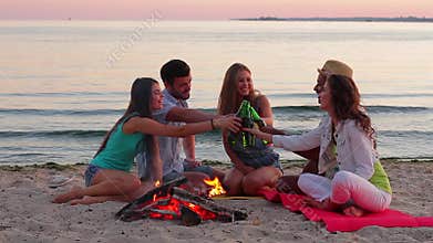 Young people drinking beer on vacation.