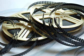 Film reels on white background