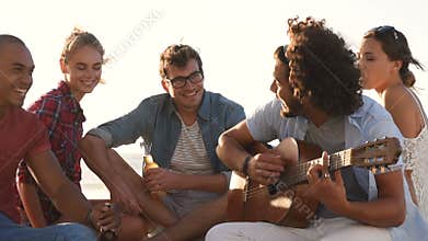 Friends toasting with beer