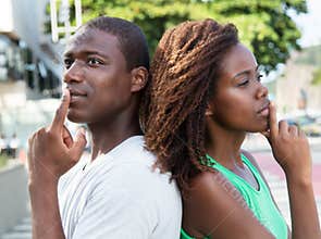 Thinking african american couple in the city
