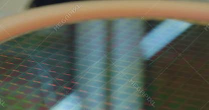 Macro tracking shot of a Silicon wafer