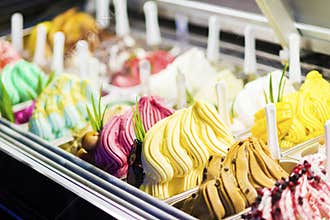 Mixed colourful gourmet ice cream sweet gelato in shop display