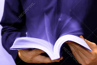 Fast learning: man reading book in motion
