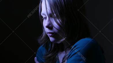 The young lonely and upset teen girl. Thinking of problems in her life. 4K UHD.
