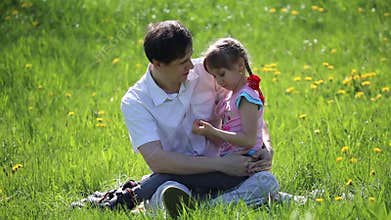 Father hugging daughter