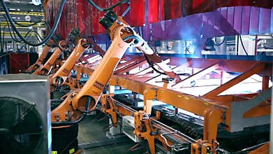 Welding robots on industrial factory