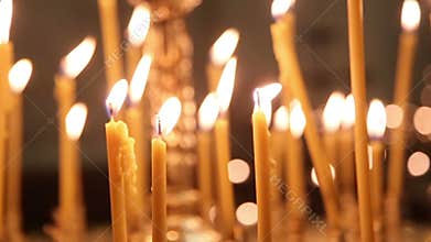 Burning Candles Before The Altar In The Church