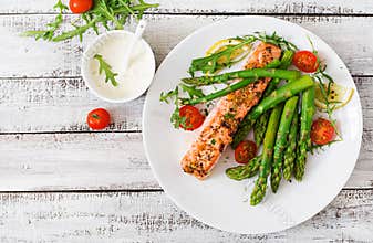 Baked salmon garnished with asparagus