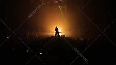 Silhouette of rock star on concert