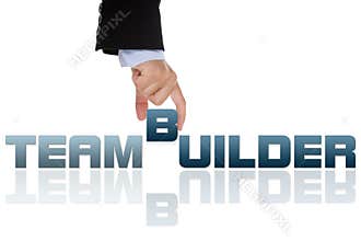 Woman building team word with letter blocks