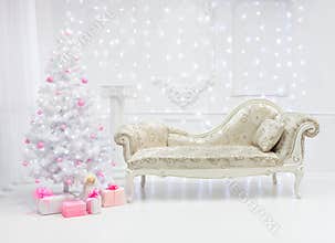 Classic Christmas light interior in white and pink tones with a couch