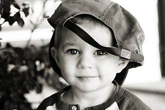 Cute boy wearing baseball hat