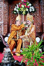 Javanesse Moslem Bride and Groom in Traditional Wedding