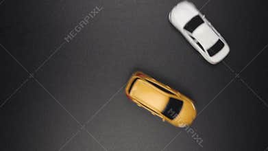 SLOW MOTION: Crash of two toy cars on a road face to face