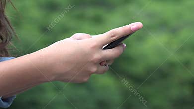 Girl Using Smart Phone Or Texting
