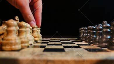 Side shot footage of two players playing chess