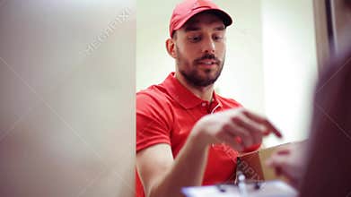 Happy man delivering parcel boxes to customer home