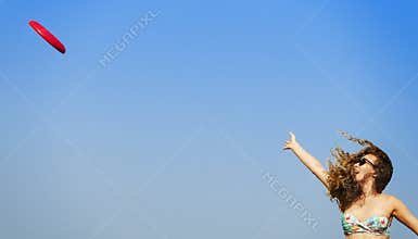 People Playing Frisbee Catch Concept