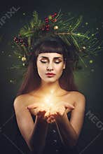 Beautiful girl with christmas crown