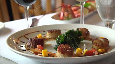 Pan down to a nice seafood dinner