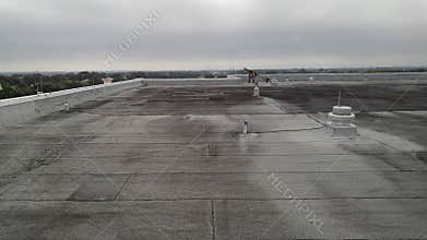 Modified flat roof; commercial roofing leak repairs
