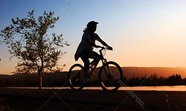 Woman riding her bike